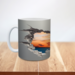 3D faux-hole sunset ceramic mug personalized. Faux-hole effect revealing golden sky on mug. Custom name sunset coffee cup 11 oz.